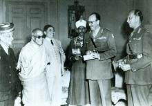 C. Rajagopalachari photographed with General K.M. Cariappa, the new Commander-in-Chief and the outgoing Commander-in-Chief General Roy Bucher at Government House, New Delhi